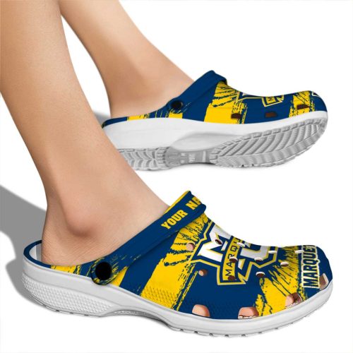 personalized marquette golden eagles paint splatter graphics clog fashion forward