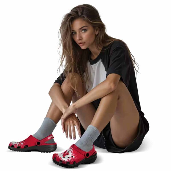 personalized nebraska cornhuskers splatter background crocs premium grade
