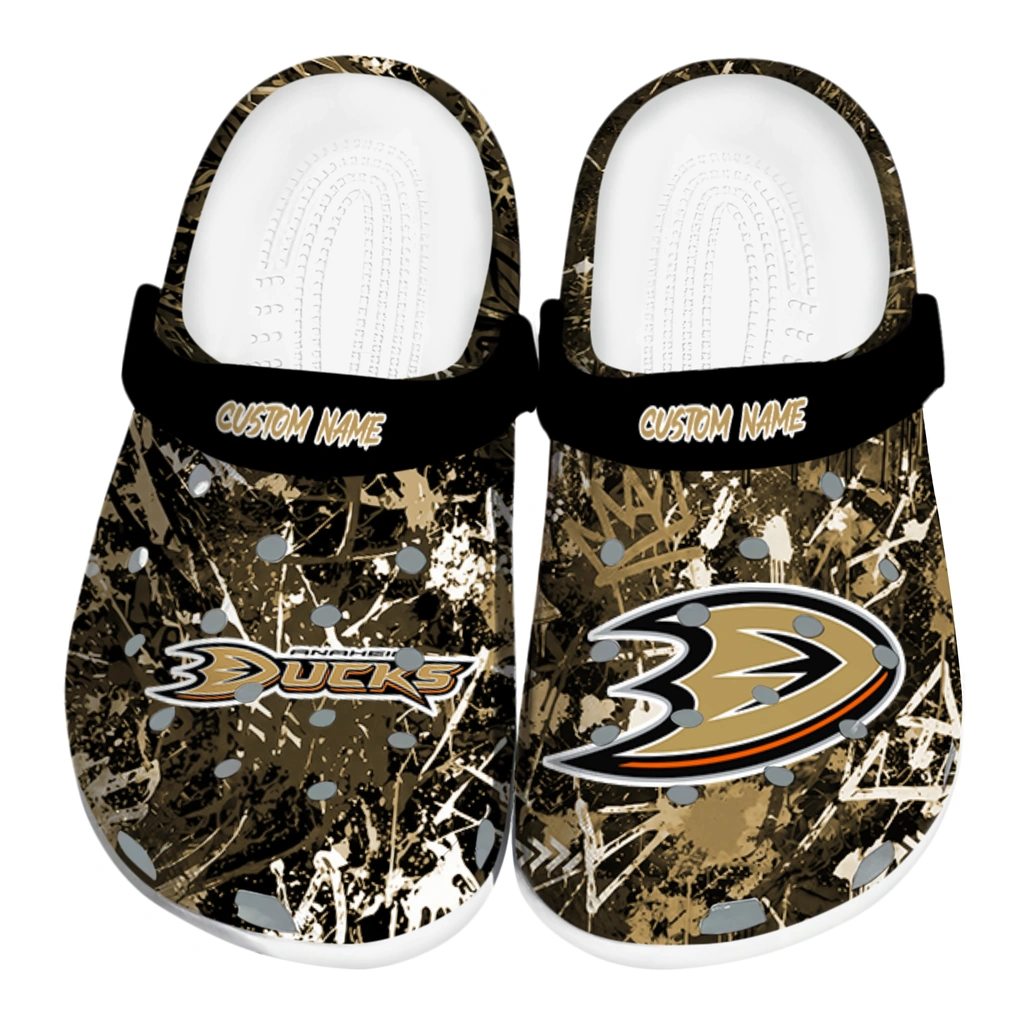 anaheim-ducks-clog-custom-graffiti-burst-gold-black-best-selling.webp anaheim ducks clog custom graffiti burst gold black best selling