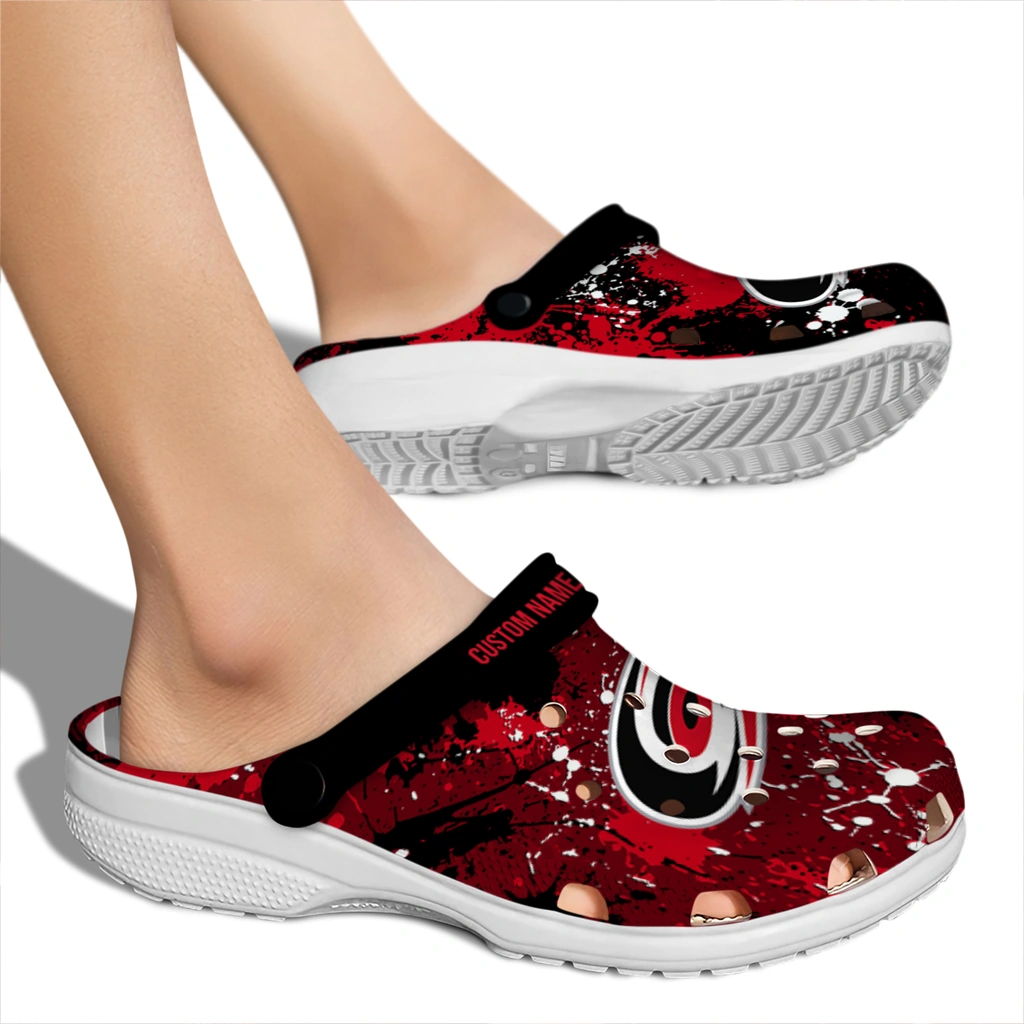 carolina-hurricanes-clog-customized-splatter-splash-red-black-fashion-forward.webp