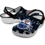edmonton-oilers-clog-personalized-graffiti-burst-blue-black-best-selling.webp