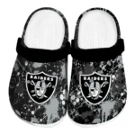 Las Vegas Raiders Clogs - Customized Splatter Splash Black 1 las-vegas-raiders-clog-customized-splatter-splash-black-best-selling.webp
