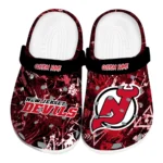 new-jersey-devils-clog-personalized-graffiti-burst-red-black-best-selling.webp