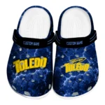 Toledo Rockets Clogs - Personalized Cracked Energy Blue Black 1 toledo-rockets-clog-personalized-cracked-energy-blue-black-best-selling.webp