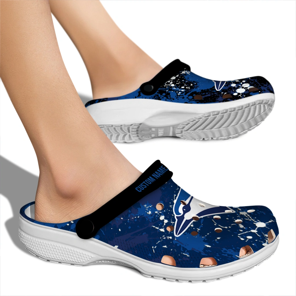 toronto-blue-jays-clog-customized-splatter-splash-blue-black-fashion-forward.webp