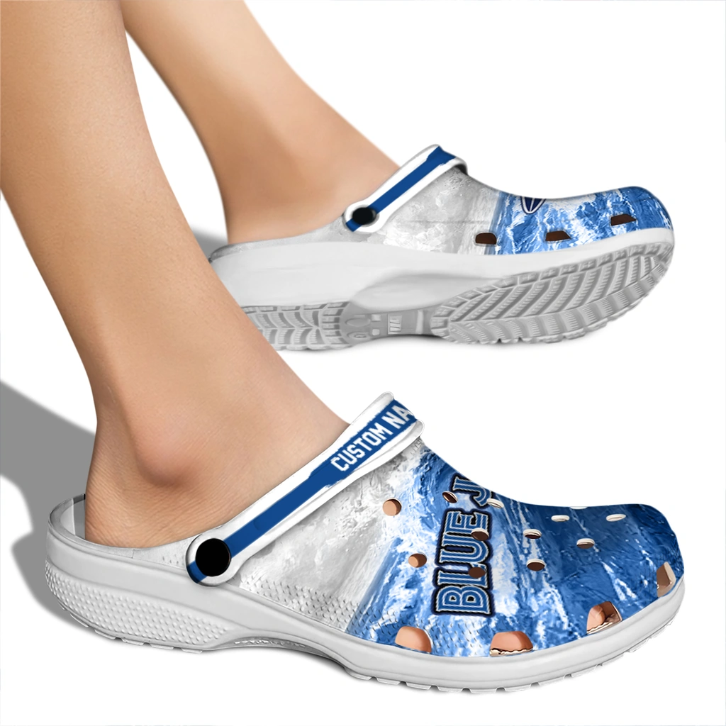 toronto-blue-jays-clog-personalized-wave-swirl-blue-white-fashion-forward.webp