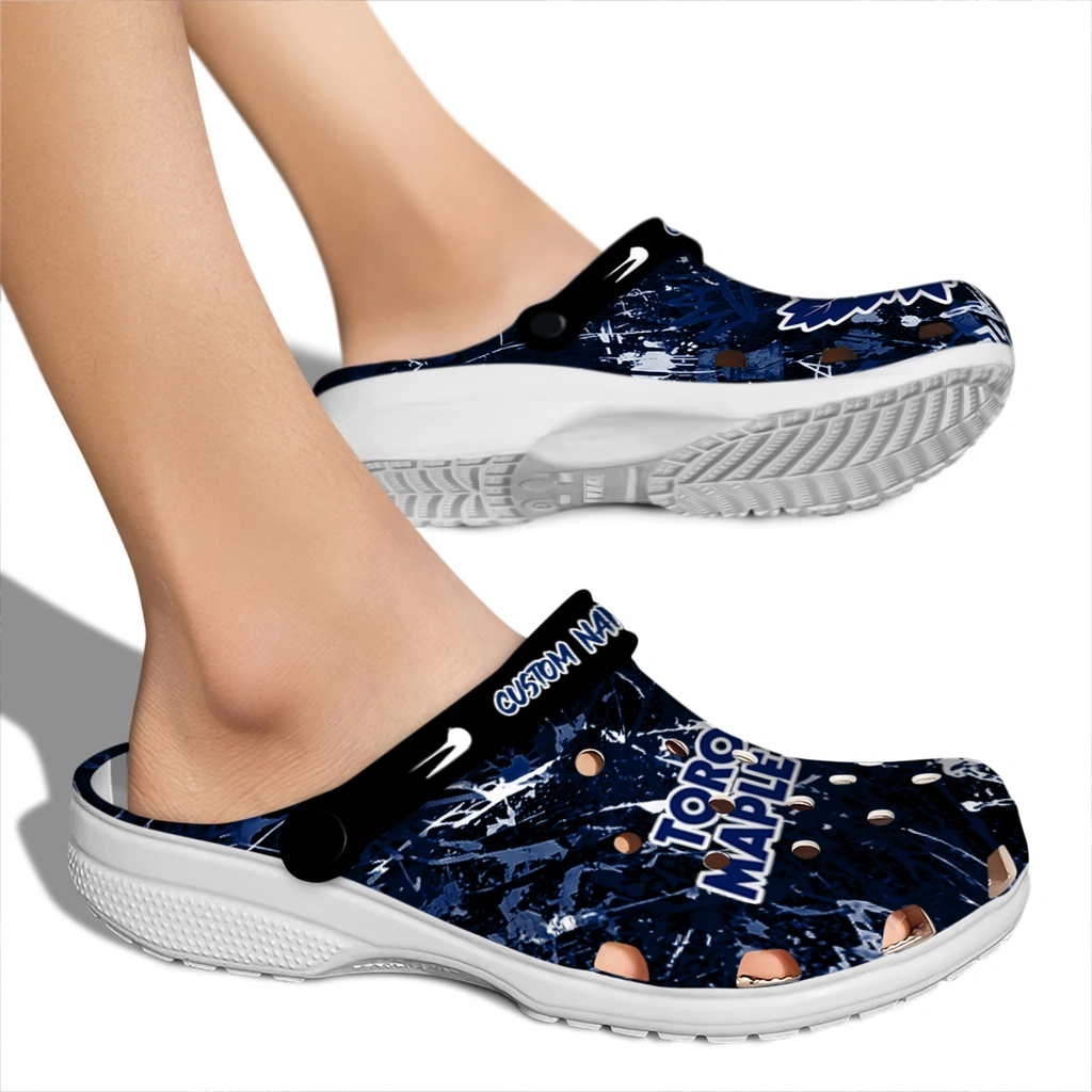 toronto-maple-leafs-clog-custom-graffiti-burst-blue-black-fashion-forward.webp