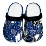 Toronto Maple Leafs Clogs - Personalized Splatter Splash Blue Black 1 toronto-maple-leafs-clog-personalized-splatter-splash-blue-black-best-selling.webp