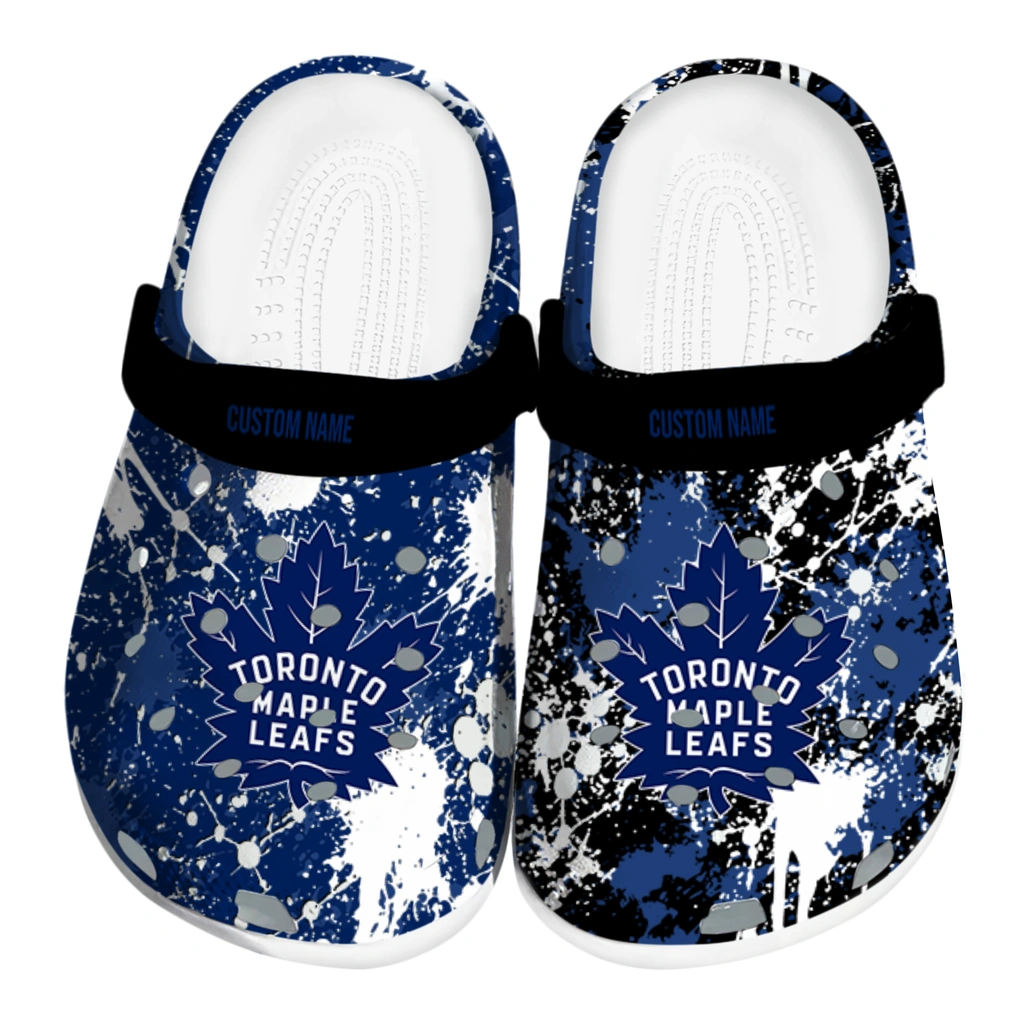 toronto-maple-leafs-clog-personalized-splatter-splash-blue-black-best-selling.webp toronto maple leafs clog personalized splatter splash blue black best selling
