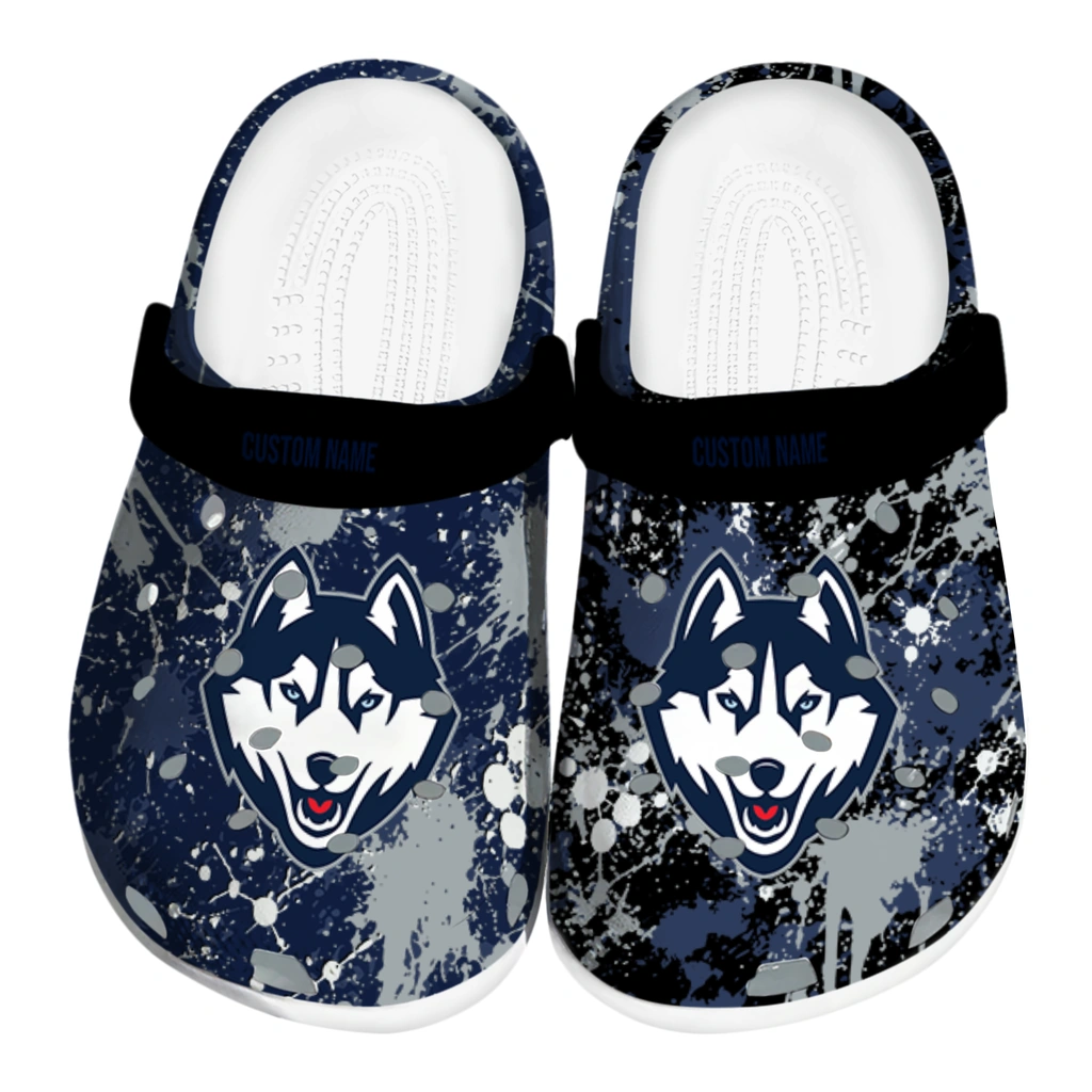uconn-huskies-clog-personalized-splatter-splash-blue-black-best-selling.webp uconn huskies clog personalized splatter splash blue black best selling